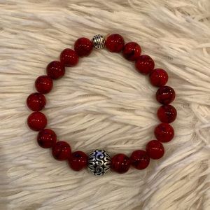 Men’s red beads w/silver filigree accent bracelet.